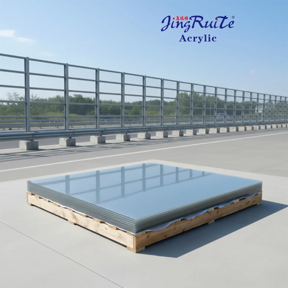 Stack of clear acrylic noise barrier sheets on pallet for industrial and highway sound insulation