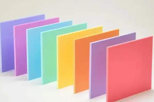 A row of multi-colored pastel acrylic sheets with a matte finish, showcasing soft color saturation for decorative lighting design.